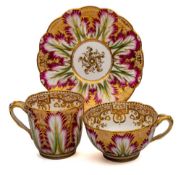 Four John Ridgway porcelain trios: each comprising two cups and a saucer, one decorated in red,