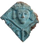 A 16th Century carved wood roof boss: of lozenge-shaped form,