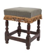 A late 17th Century oak square stool:, with stuff over seat,
