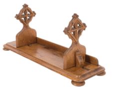 A 19th Century oak book trough in the Gothic taste: the rectangular base with two sliding ends