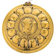 An 18th Century German or Scandanavian brass warming pan lid: with pierced and embossed decoration