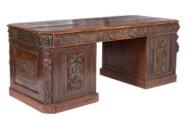 An early 19th Century 'Antiquarian' oak partner's desk:,