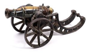 A brass model percussion cannon: 19.