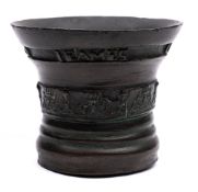An early 17th Century mortar: cast 'Ieames Butlar made em' with a band of overlapping hoops with