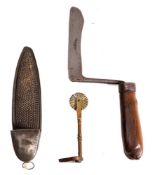 A 19th Century tin plate nutmeg grater and box: of shoe-shaped form,