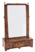 An early 18th Century walnut swing frame platform toilet mirror:,