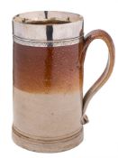 A London saltglazed stoneware quart tankard: the grey body with reddish freckled dip,