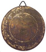 A 17th Century brass warming pan lid: depicting a leopard passant and 'Put your trust in God', 27.