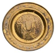 A late 17th/early 18th Century Dutch or Belgian (Malines) brass alms dish: with embossed decoration