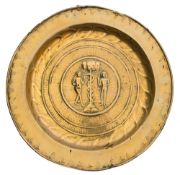 A 16th/early 17th Century Nuremberg brass alms dish: centred with embossed decoration of Adam & Eve