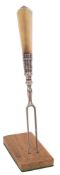 An 18th Century two-prong, close-plated fork: with silver mounted agate handle, 15cm long.