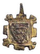 A late Medieval gilt metal horse harness pendant: of square outline with heraldic shield bearing