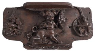 A late 14th/early 15th Century carved oak misericord: the seat supported by a manticore with