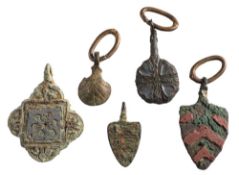 A late Medieval horse harness pendant: of shield-shaped outline decorated with red chevrons,