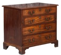 A George III mahogany gentleman's dressing chest: the top with a moulded edge,