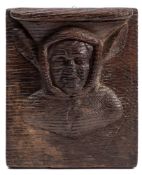 Attributed to Claes De Bruyn, a mid 15th Century carved oak Misericord: of a jester in costume,