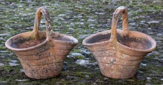 A pair of terracotta basket flower pots: with ribbed sides, 38cm (1ft 3in) long,