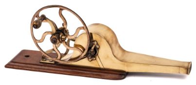 A 19th Century brass and mahogany mechanical bellows: the hand cranked fly wheel with horn handle