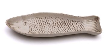 A Staffordshire white saltglazed stoneware tripod mould: in the form of a fish, circa 1760,