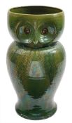 An zoomorphic pottery stick stand: attributed to Bourne Denby and in the form of an owl with