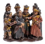 A 16th Century oak and polychrome carved group,