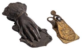 Two mid 19th Century brass paperclips: one cast 'Merry Phipson & Parker', brassfounders, Birmingham,