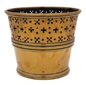 An 19th Century brass bucket or jardiniere: of cylindrical tapering form with pierced cruciform