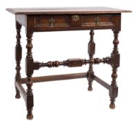 A Charles II oak rectangular side table:, the overhanging top with a moulded edge,