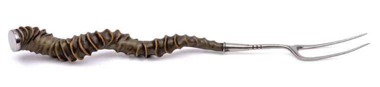 An early 19th Century Scottish bannock toaster: with silver mounted antelope horn handle, 51cm long.