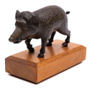 A bronze model of a wild boar: finely cast with chased and chiselled coat, golden brown patination,