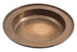 A late 17th/early 18th Century brass basin: of plain circular form with applied solid rim, 42.