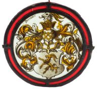 A 19th Century stained glass armorial roundel: entitled 'December',