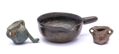 Three 17/18th Century copper alloy miniature toys: comprising a cooking pot and two twin-handled