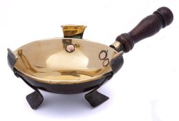 An 18th Century Dutch small brass chafing dish: of circular form raised on three swept feet with