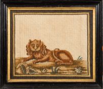 A pair of 19th Century naive woolwork pictures of a lion and tiger: the lion lying on a grassy bank,