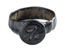 A bronze seal ring: ascribed Romano/British c.A.D 400.