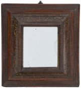 A 17th Century fruitwood and gilt decorated ripple moulded mirror:,