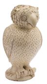 A Skotterup (Danish) pottery money box in the form of an owl: decorated in cream slip,