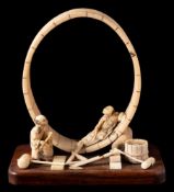 A Japanese carved ivory and bone okimono: in the form of coopers at work,