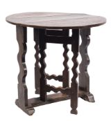 A late 17th Century oak oval gateleg occasional table:,