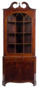 A George III mahogany and inlaid standing corner display cabinet: crossbanded in kingwood,