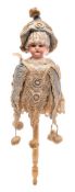 A late 19th/early 20th Century German bisque head musical spinning doll: impressed 3200,