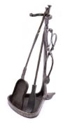A set of Arts & Crafts period polished steel fire tools with stand: includes tongs,