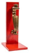 A 19th Century brass Doctor's pattern trophy door knocker: of scroll form,