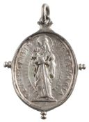 A 17th Century oval silver badge: Obv Mary holding the Christ child, Rev.