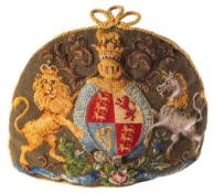 A Victorian patriotic woolwork tea cosy: of domed form, each side displaying the Royal Coat-of-Arms,