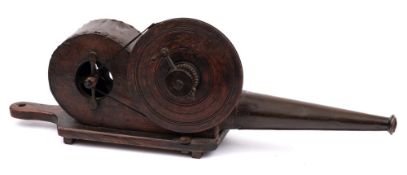 A 19th Century mechanical bellows: with hand cranked fly wheel and tapering tin nozzle, 80cm. long.