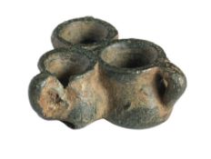 A rare copper alloy miniature triple fuddling cup:, 2.75cm wide.