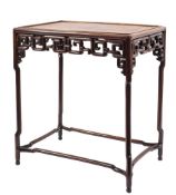 A Chinese Hua Li wood rectangular occasional table: with a moulded tray top and pierced geometric