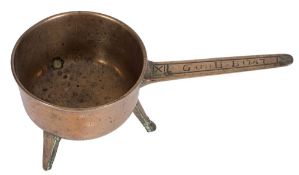 An 18th Century bronze skillet: of traditional design, the handle engraved G--H B1747,